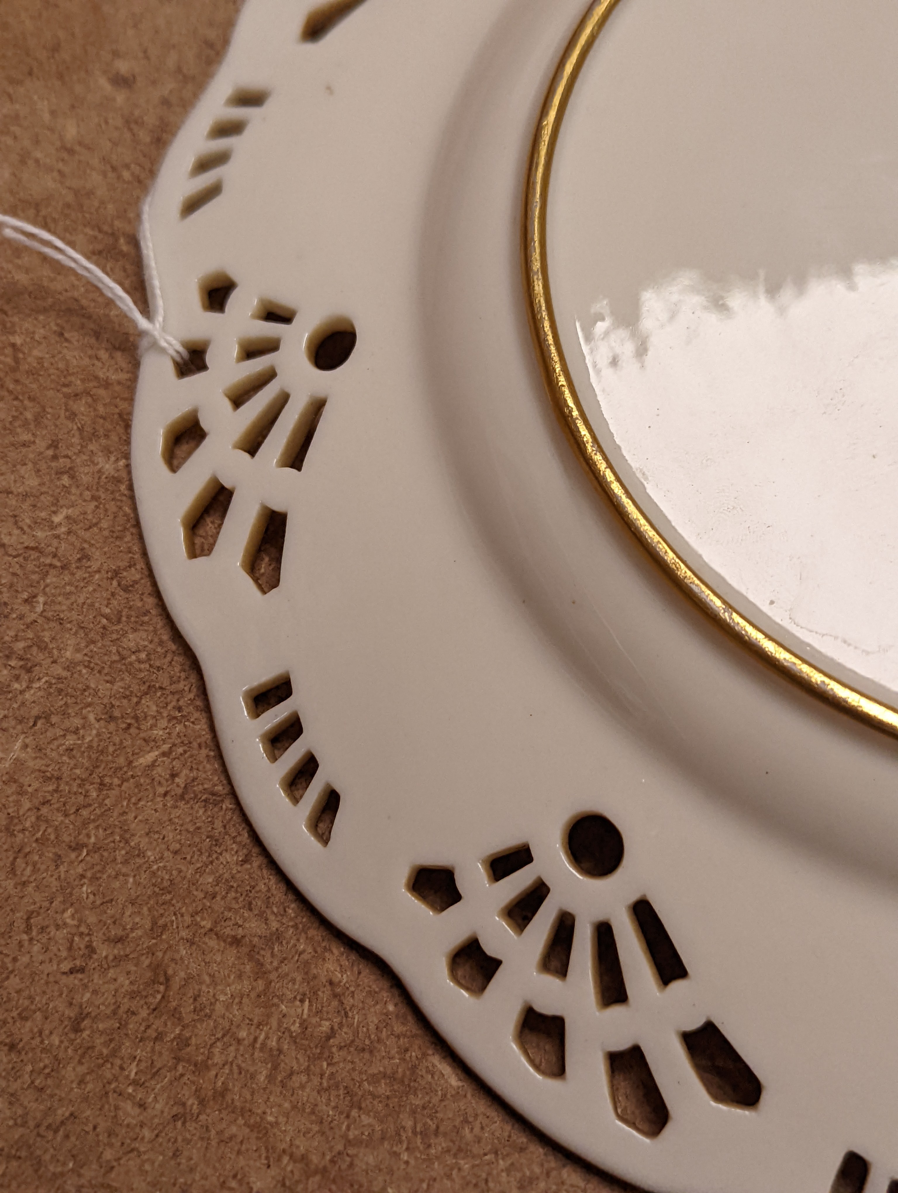 A Mintons pate sur pate cabinet plate, attributed to Alboin Birks, c.1905, diameter 23cm